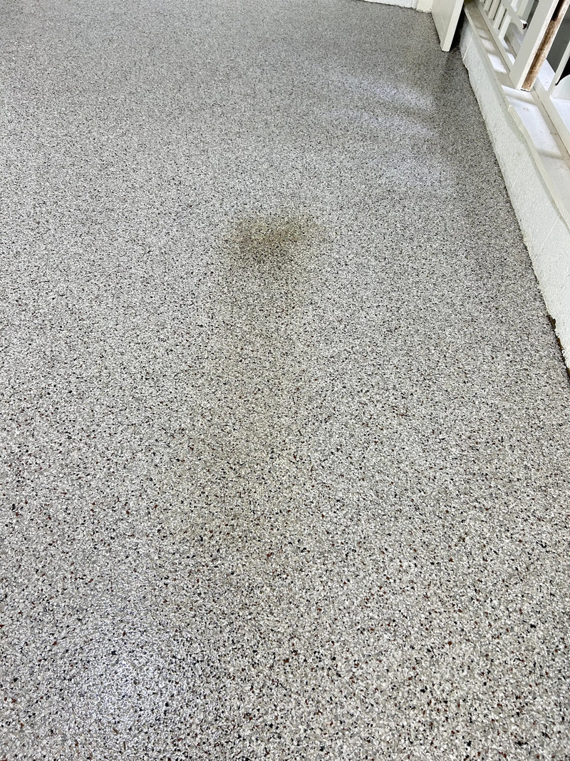 Stained epoxy floor before